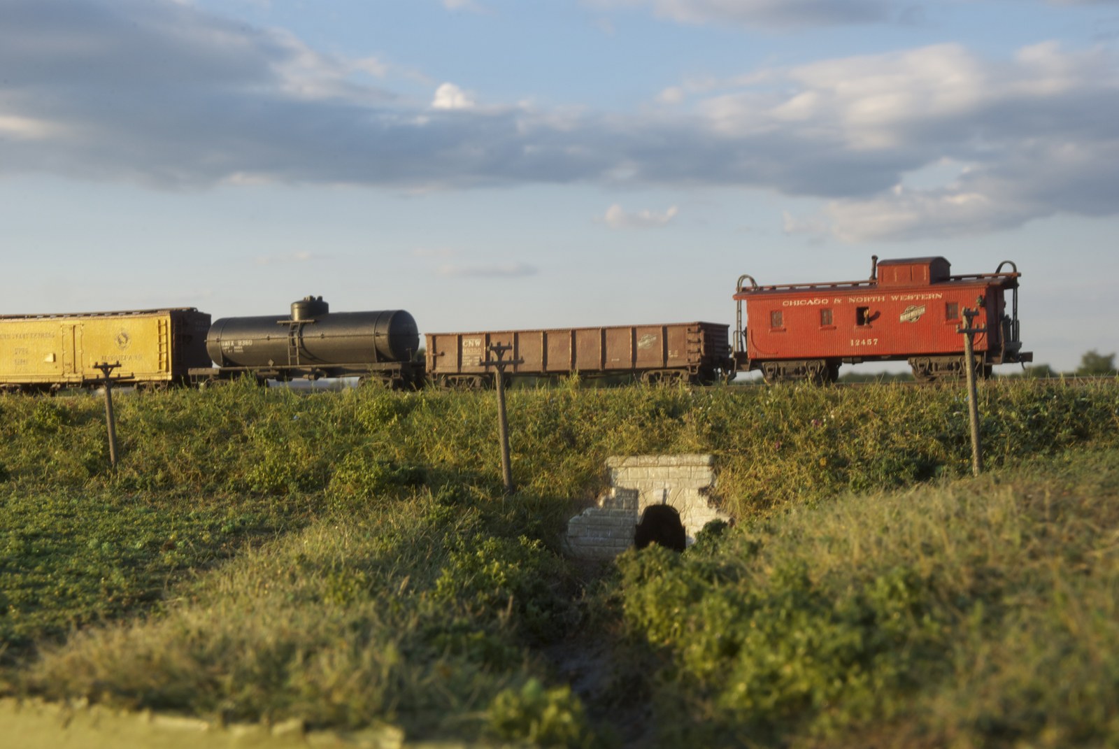 C&NW caboose train above the creek culvert on the Modutrak Highway 20 module