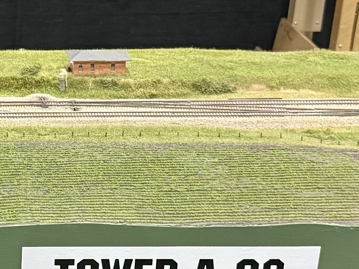 The small tower beside the mains on the Tower A-68 module, with a big crop field in front